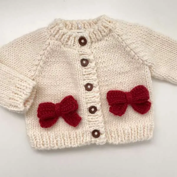 The Blueberry Hill Holiday Classic Knit Bow Cardigan, Cream & Red